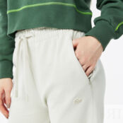 Женские двухслойные спортивные штаны Lacoste
